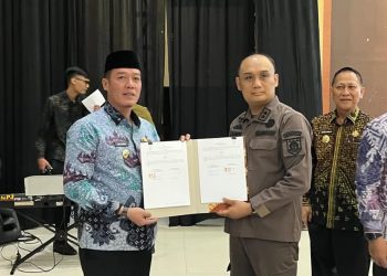 Bupati Pesisir Barat Hadiri Penandatanganan Perjanjian Kerja Sama Sinergitas Pelaksanaan Tugas dan Fungsi Pengelolaan Keuangan Desa