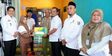 Bupati Pringsewu Santuni Keluarga Pekerja Migran Yang Meninggal Dunia di Malaysia 