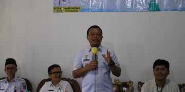 Bupati Pringsewu Serahkan Bantuan Pangan Tahun 2026 di Pekon Rejosari