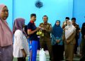 Bupati Pringsewu Serahkan Bantuan Pangan Pemerintah Tahun 2026 di Pekon Banyumas